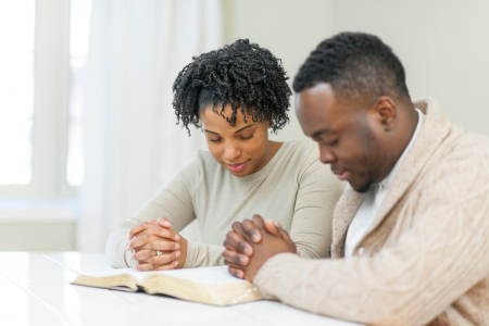 woman and man reading bible