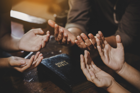 group of people praying