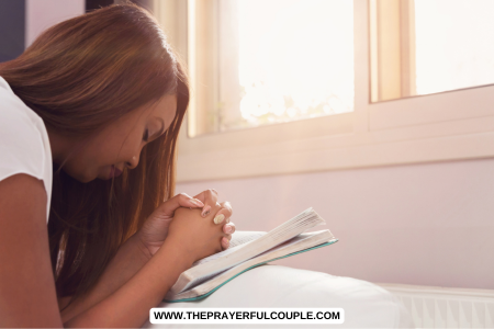 woman with bible praying for her granddaughter