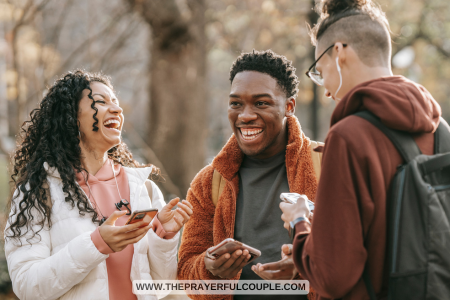 3 friends laughing at funny Bible verses on their cellphones