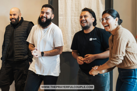 3 young men and a young woman smiling