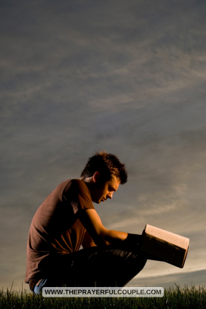 A man in the field with the Bible